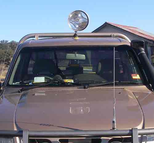 Powa Beam 245mm QH 100W bracketed spotlight mounted on vehicle